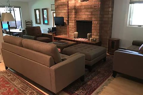 Living Room, dining area to left. New sofa set.