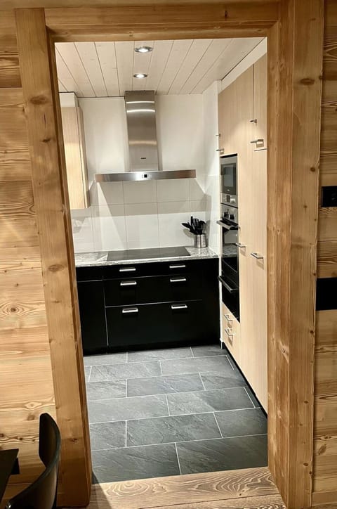 Furniture, Flooring, Wood, Interior Design, Floor, Countertop, Cabinetry, Ceiling, Wood Flooring, Kitchen