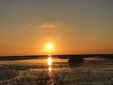 Sunset from the beach to the rear of Combe n Sea