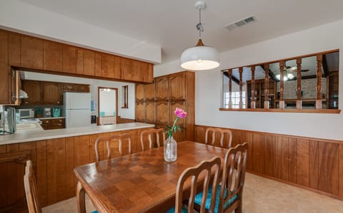 Breakfast nook with opening to living room