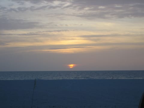 On the beach, sun loungers, beach towels