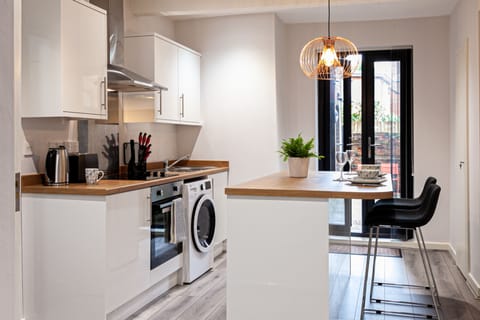 Kitchen and breakfast bar at The Courtyard