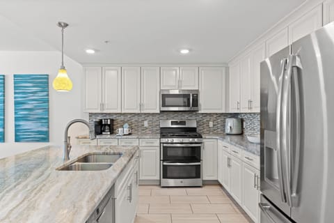 Chef's dream kitchen with high-end appliances and a view to inspire