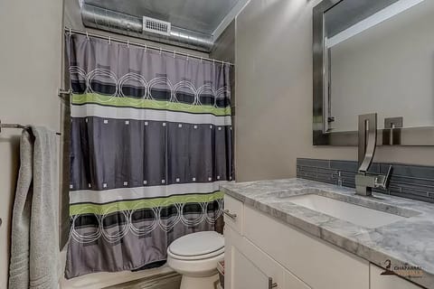 Combined shower/tub, towels, soap, shampoo