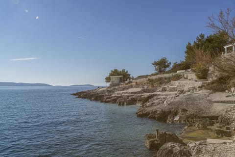 Beach nearby, sun loungers