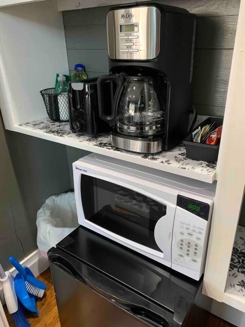 Microwave, coffee/tea maker, toaster, cookware/dishes/utensils