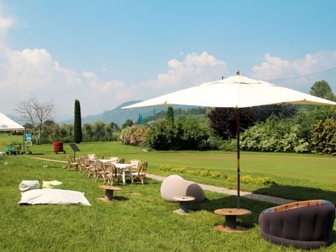 Sky, Cloud, Ecoregion, Plant, Tree, Shade, Land Lot, Outdoor Furniture, Biome, Leisure