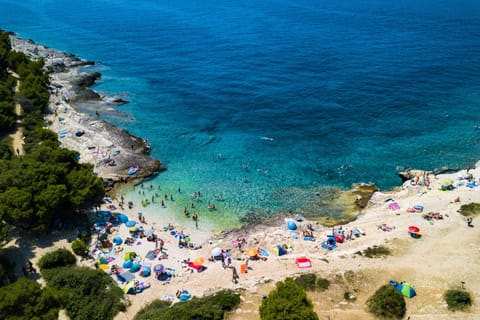 Beach nearby, sun loungers