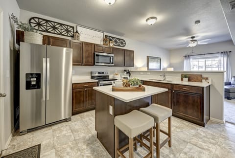 Kitchen with stainless steel appliances and  Quartz counter tops