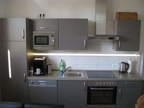 Fridge, microwave, dishwasher, coffee/tea maker