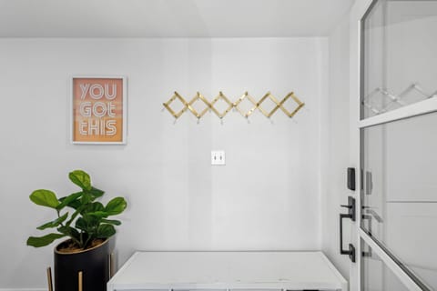 Upstairs front door, storage for shoes, jackets, etc..