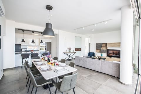Dining Area with table and chairs to seat 8 people