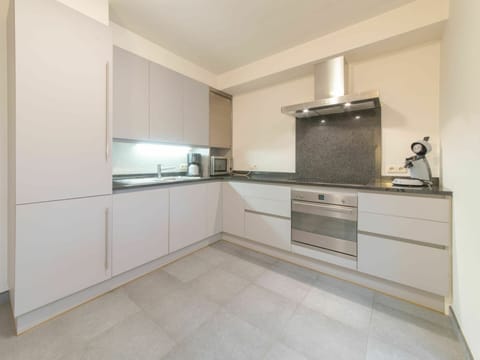 Cabinetry, Countertop, Furniture, Building, Kitchen Appliance, Kitchen Stove, Home Appliance, Kitchen, Wood, Interior Design