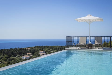 An infinity pool, sun loungers