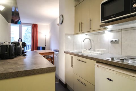 Galley kitchen leading to the lounge