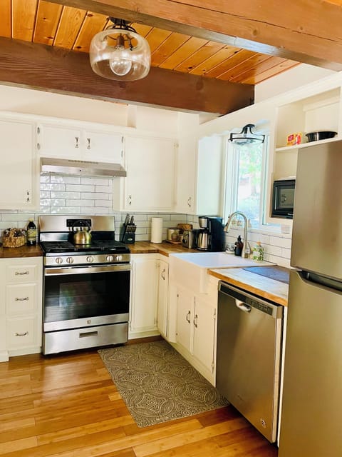 Kitchen stocked with all you need, wine glasses, cookware, kids plastic dishes