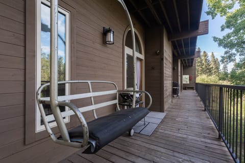 Common patio area, directly outside of primary bedroom door.