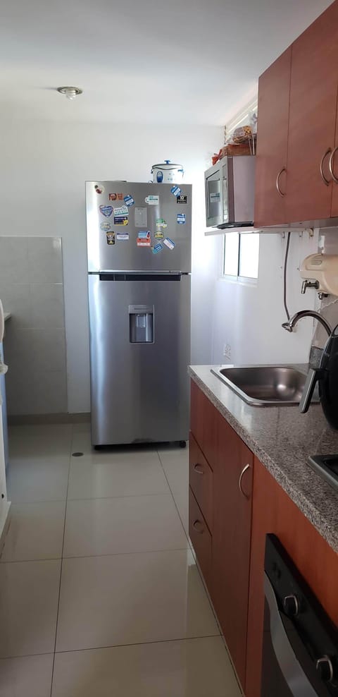 Fridge, microwave, oven, cookware/dishes/utensils