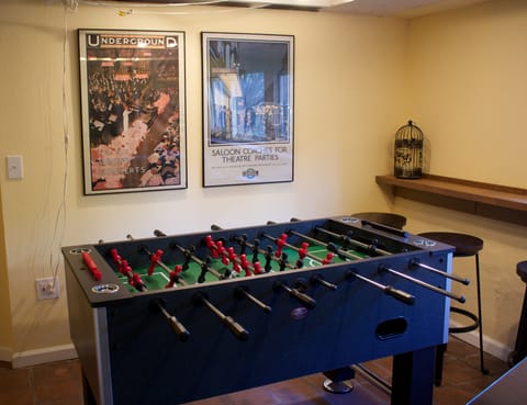 Foosball table in the game room. There's also a portable air hockey table.