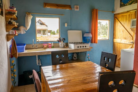 Fridge, stovetop, coffee/tea maker, electric kettle