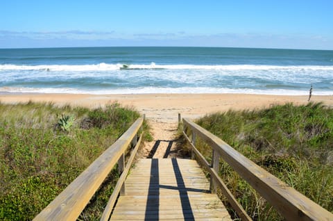 On the beach, sun loungers, beach towels