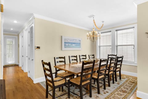 Seating for 14 between the large kitchen table, and 4 additional seats at the kitchen island.