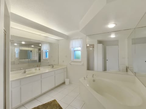 Combined shower/tub, hair dryer, towels, soap