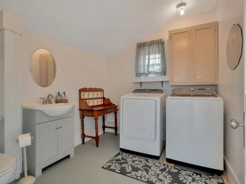 Bathtub, jetted tub, hair dryer, towels