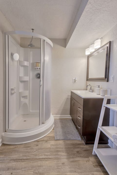 Combined shower/tub, hair dryer, towels, soap