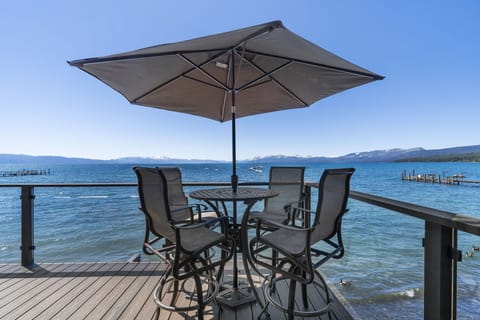 Outdoor dining on your own private lakefront deck