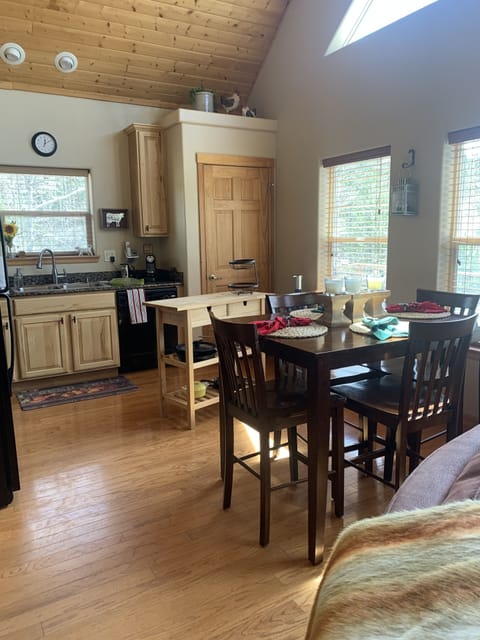 Kitchen.  Shows dining table that seats 6.