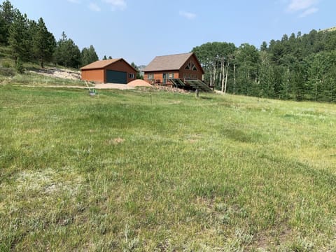 The cabin in the meadow.