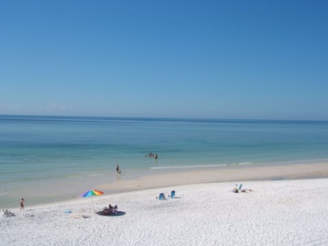 On the beach, sun loungers, beach towels