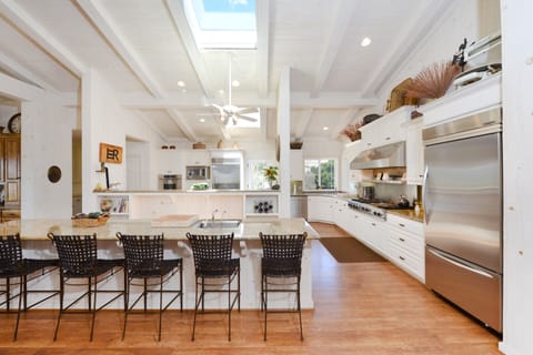 Incredible chef's kitchen with high end appliances and six-burner gas range