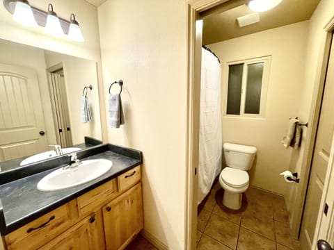 Combined shower/tub, hair dryer, towels, soap