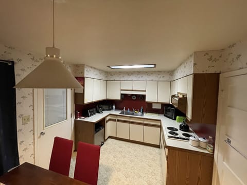 Kitchen with stove and other appliances. 

We do not have a large oven.