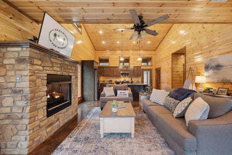 Open concept with den & kitchen.  It's cozy with gas fireplace and open windows.