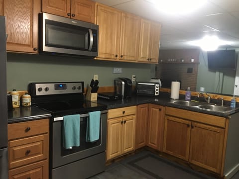 Microwave, coffee/tea maker, cookware/dishes/utensils