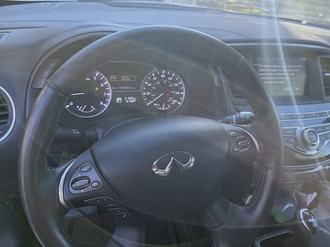 Travel in Comfort and Style with our Reliable Car Rental • Infiniti QX60 LUXE •