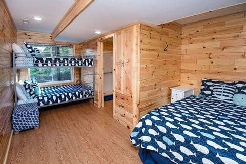 Of the 11 BR-BA suites 2 of them have a Queen bed, Full Bunkbed + Twin Bunkbed.