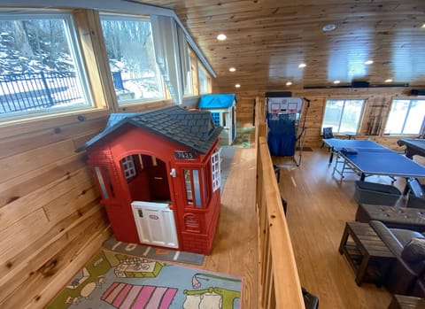 Kid's Play Loft is 29'x5' w/ 2 playhouses. The young ones have their own space!