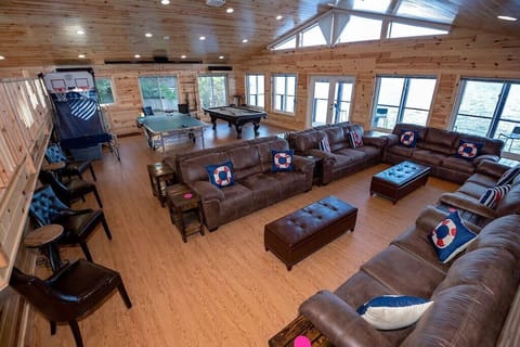 Gathering-Game Room is 885 sq ft has ping pong & pool tables. Walk out to deck.