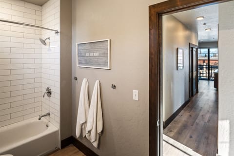 Bathtub, hair dryer, towels