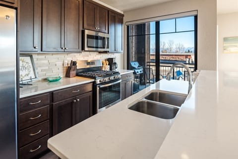 Kitchen is fully appointed.