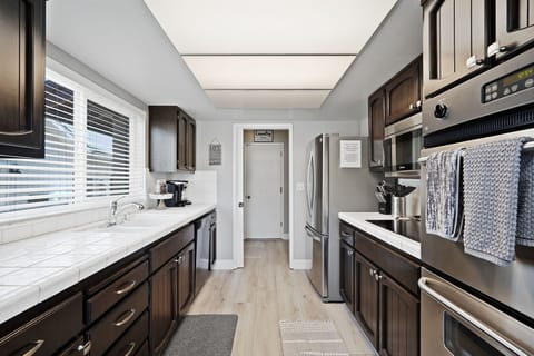 Kitchen with access to laundry room (no garage access)