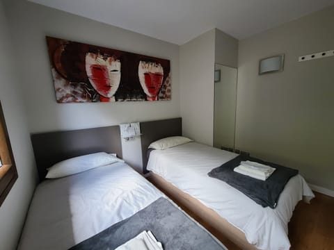 2 bedrooms, in-room safe, iron/ironing board, WiFi