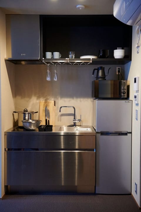 Fridge, microwave, stovetop, cookware/dishes/utensils