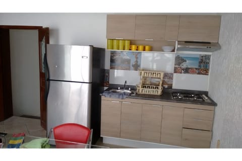 Fridge, microwave, blender, cookware/dishes/utensils