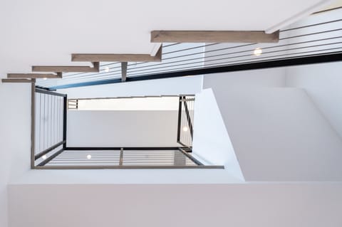 The house is 3 levels with a rooftop deck on the 3rd level