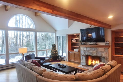 Living area | Flat-screen TV, fireplace, foosball, table tennis